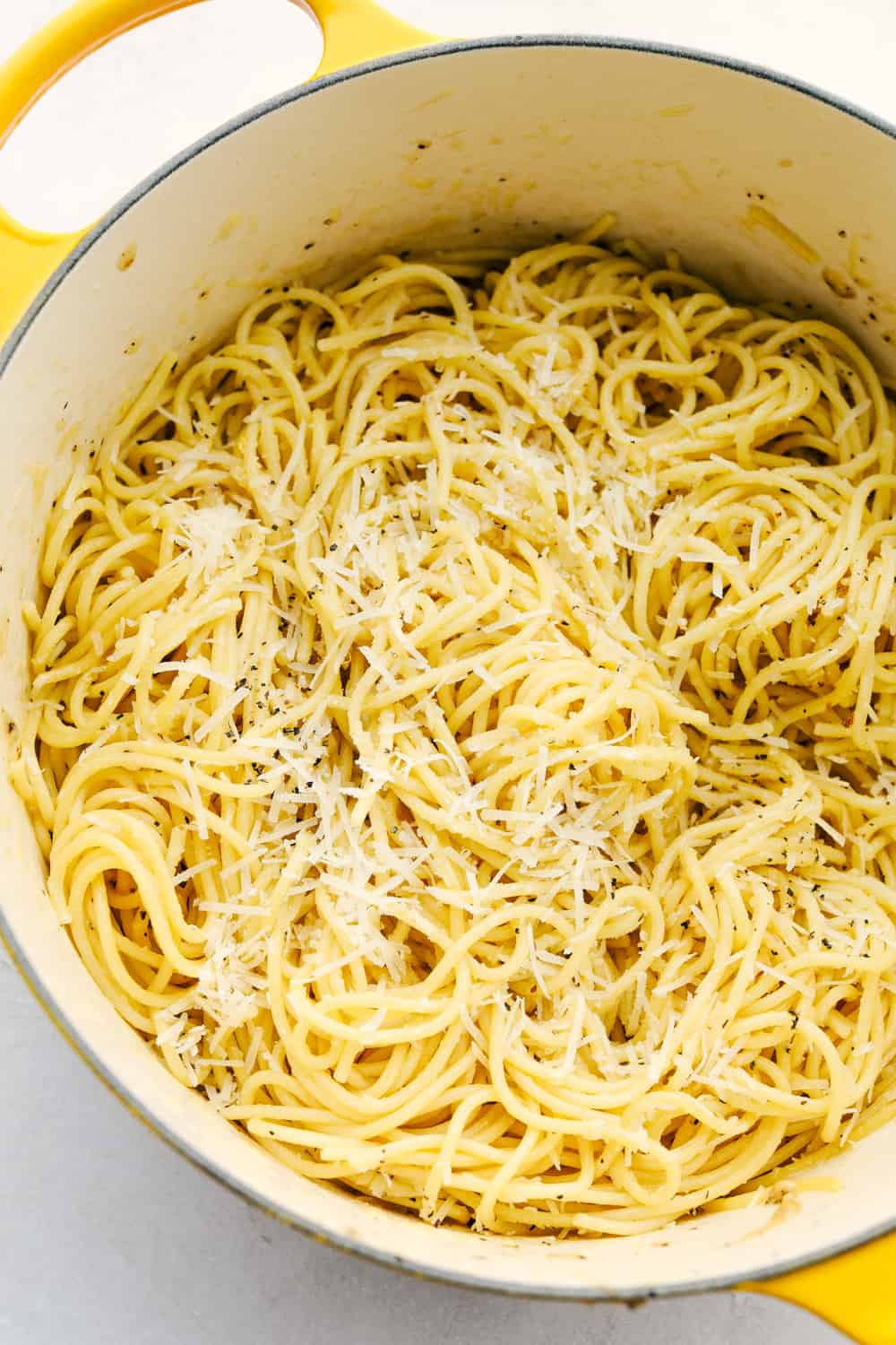 Cacio e Pepe is a quick cheesy dish that's sure to hit the spot. This is a comfort food that's easy and insanely delicious! A pot full of Cacio de Pepe.