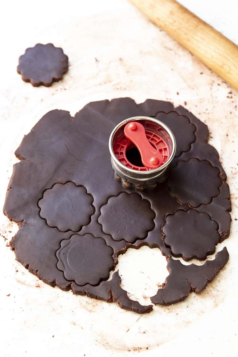 These Thin Mints are way better than the popular boxed version! Perfectly crispy chocolaty cookies are sweetened with just the right amount of mint! Using a cookie cutter to cut out the cookies.
