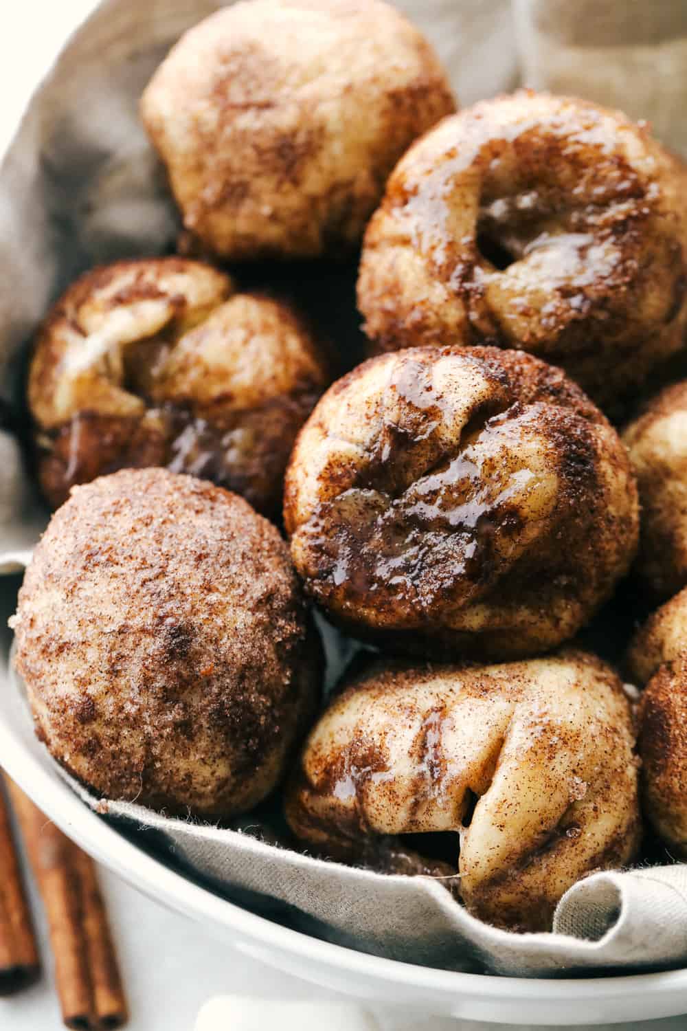 Empty Tomb Rolls are the perfect treat for Easter. Whether you have them for breakfast, brunch or dessert, they will be a huge hit! Empty tomb rolls in a basket ready to eat.