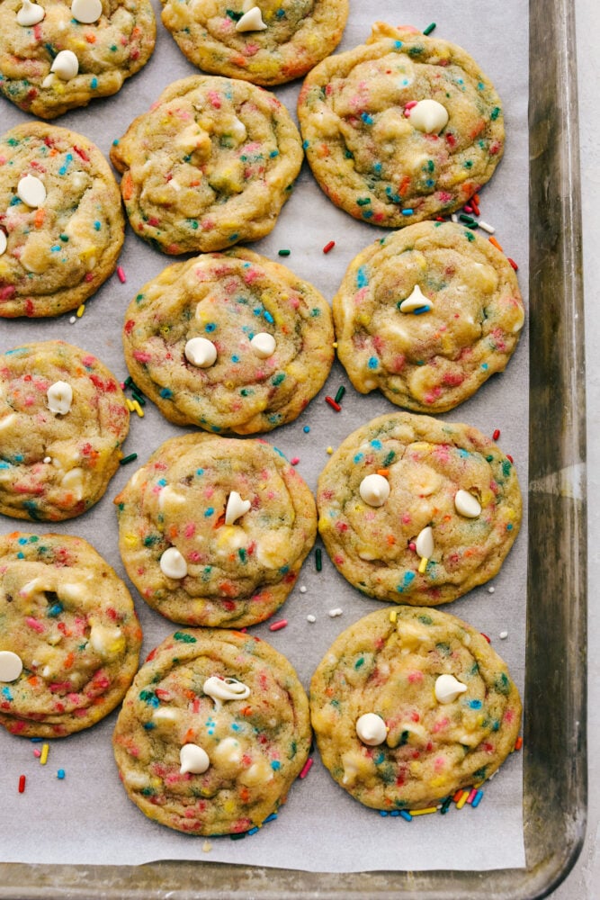 . I took my favorite pudding cookie recipe, added some cute sprinkles, white chocolate chips and cheesecake pudding. I think these were the best cookies that I have made to date. And sprinkles make everything better. :) Baked cookies with white chocolate chips.