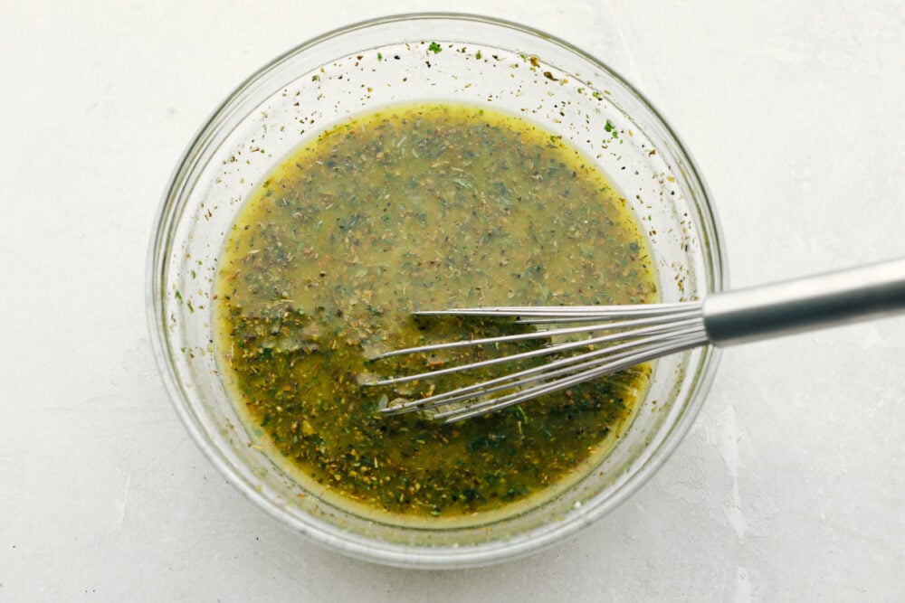 Olive Garden Salad Dressing is one of the best things at the restaurant, and now you can make it at home! Instead of having to go to the restaurant, you can have this tasty dressing anytime you crave it in the comfort of your own home! All whisked up and ready to use.