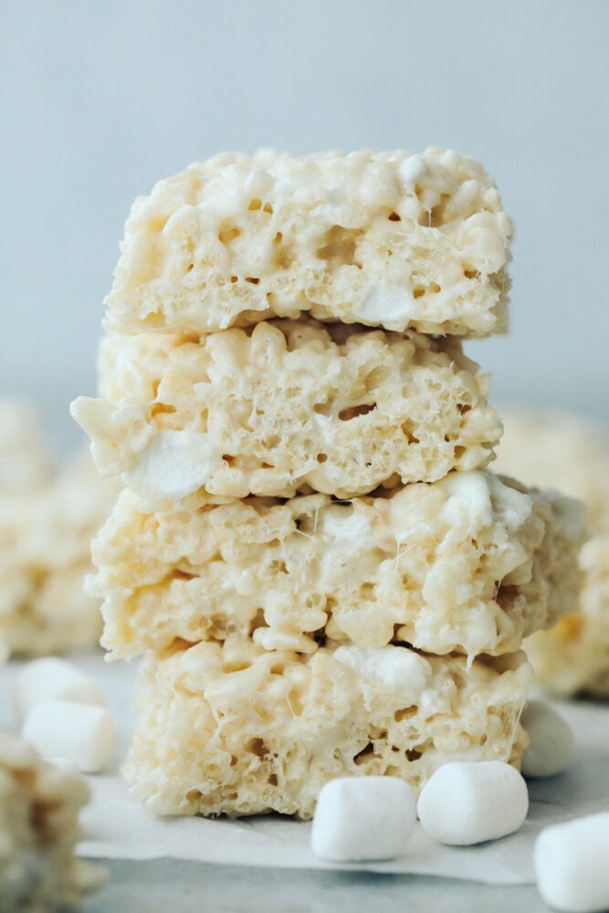 Everyone loves a good rice krispie treat. Sweet, soft, and extra ooey gooey, these Perfect Rice Krispie Treats will become your new favorite! Four rice krispies in a stack