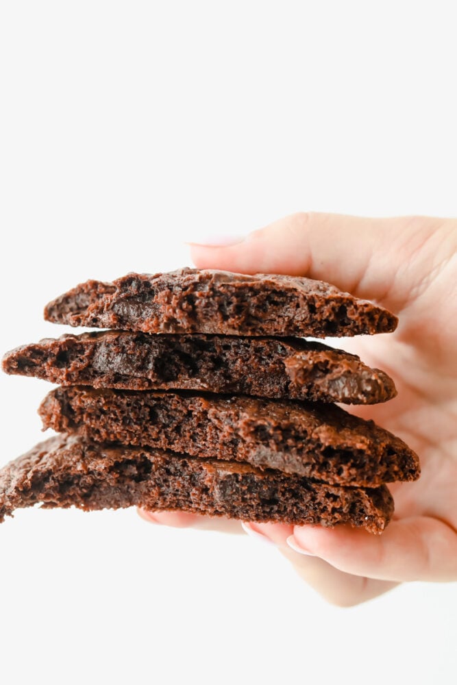 Brownie Cookies are the chewy, fudgy treat that you are not going to be able to get enough of. A combination of two of my favorite desserts, you won't believe how ooey gooey and perfect these are! Stack of 4 brownie cookies.
