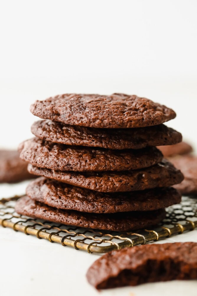 Brownie Cookies are the chewy, fudgy treat that you are not going to be able to get enough of. A combination of two of my favorite desserts, you won't believe how ooey gooey and perfect these are! Stack of brownie cookies.