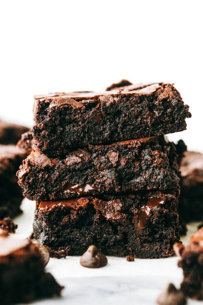 These are truly the Most Perfect Brownies Ever! These are rich, decadent and full of soul satisfying chocolate! Brownie squares are stacked on top of each other.