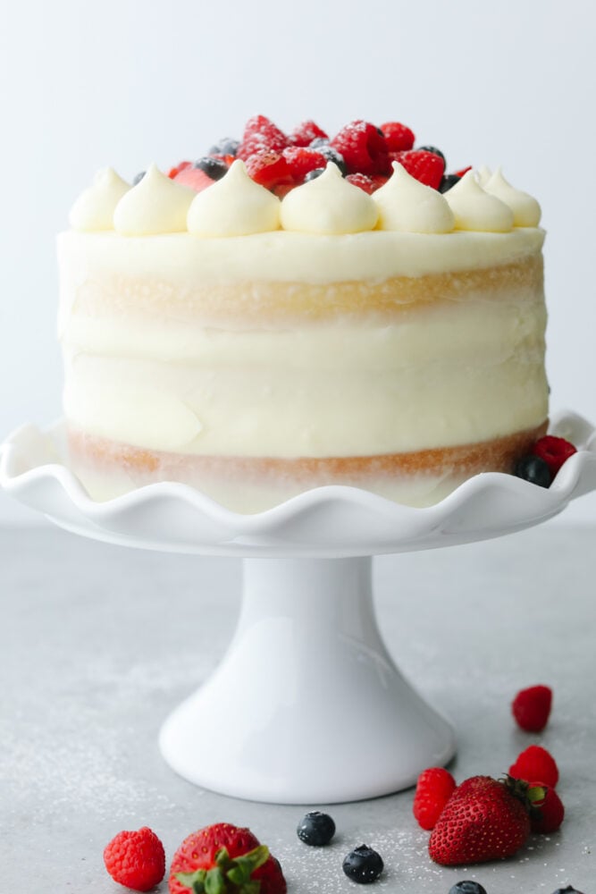 Showcase fresh summer berries with a supremely moist sponge cake and fluffy Chantilly cream! This beautiful Chantilly Berry Cake is a light, airy treat that is bound to impress! A frosted Chantilly Berry Cake.