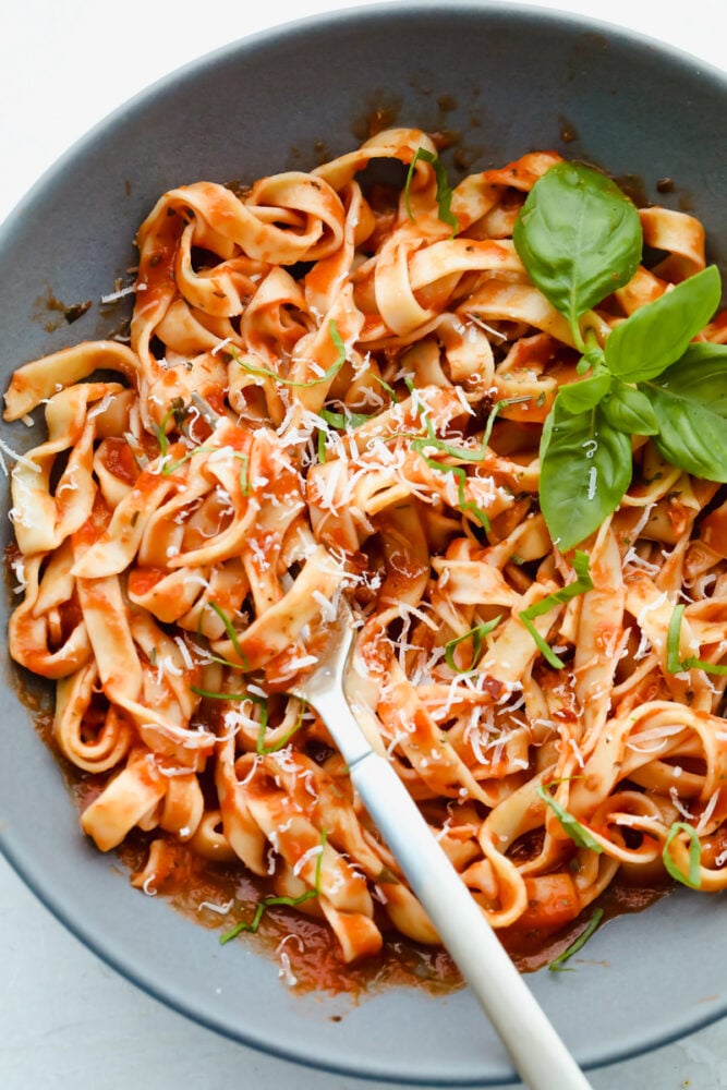 Homemade pasta is a labor of love but it is totally worth the extra work. This pasta is simple and easy, it just takes a bit of time Homemade pasta tossed with marinara sauce.