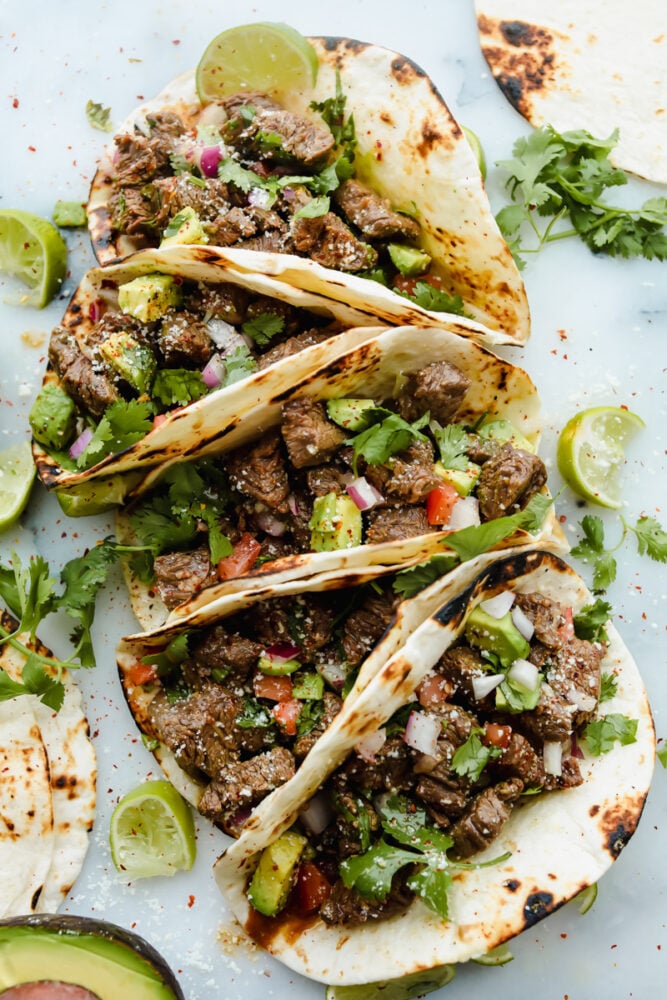 Street Tacos. Delicious, amazing, mouthwatering street tacos. I cannot stop thinking about these! They are SOO delicious. You will want to gobble these all up at once! Street tacos with toppings.