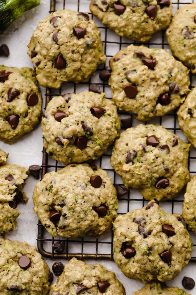 These zucchini oat chocolate chip cookies are a twist on the traditional cookie recipe and are absolutely delicious! Cookies are the ultimate comfort food that we all love and adore and after trying these, I bet you won't be able to just have one!! Finished zucchini oat chocolate chip cookies.