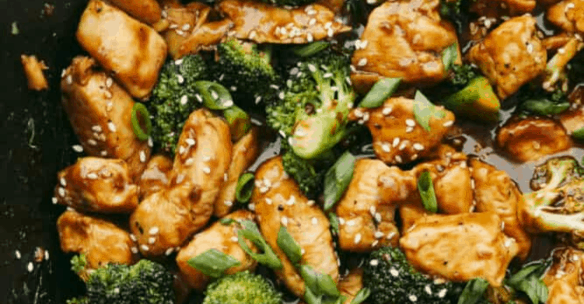 You could order takeoutโฆ or you could make my better-than-takeout hoisin chicken! It has no weird oils, no soggy broccoli. Just crisp, juicy chicken, perfectly sauced with that sweet-savory hoisin magic. Close up of the garnished hoisin chicken and broccoli.