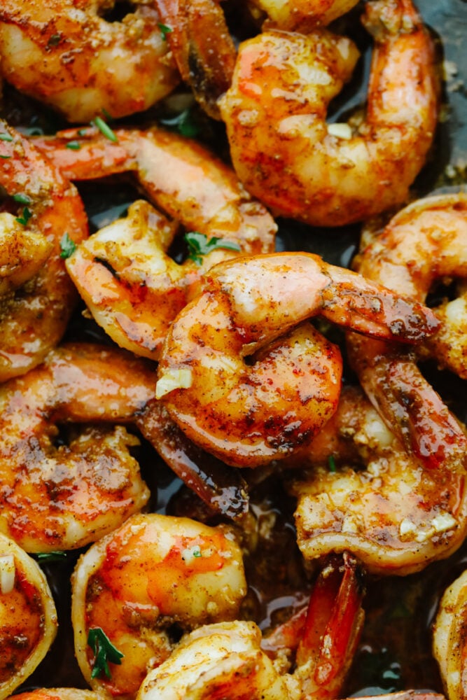 Cajun shrimp that is insanely delicious and only takes 5 minutes to make is the kind of dinner that dreams are made of! This recipe will knock your socks off and it will be something that the whole family will go crazy over! Zoomed in picture of Cajun shrimp.
