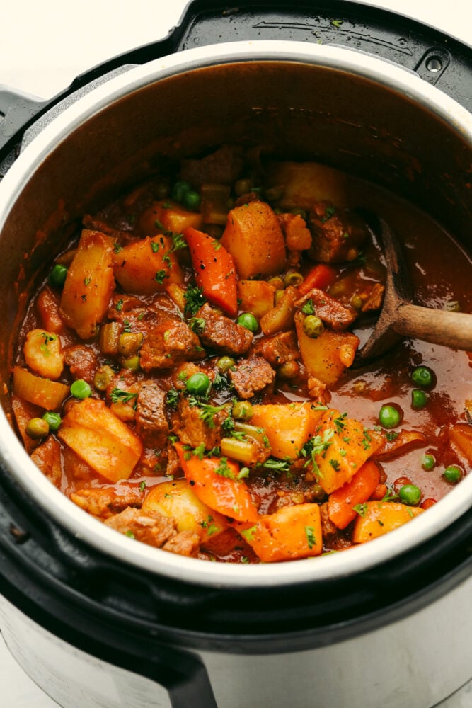 Instant Pot Beef Stew is perfect for those cool fall nights, and great when you want to whip up cozy beef stew in under an hour! Sauté the beef in the bottom of the instant pot, throw in your veggies and broth, turn it on and call it a day! Beef stew in an instant pot.