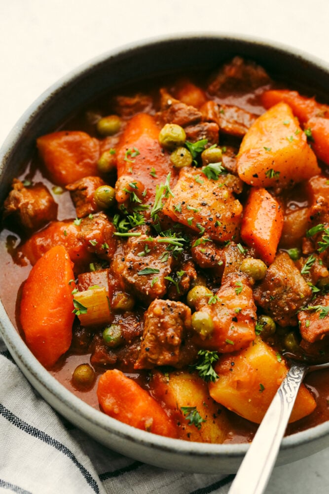 Instant Pot Beef Stew is perfect for those cool fall nights, and great when you want to whip up cozy beef stew in under an hour! Sauté the beef in the bottom of the instant pot, throw in your veggies and broth, turn it on and call it a day! A close upon instant pot beef stew.