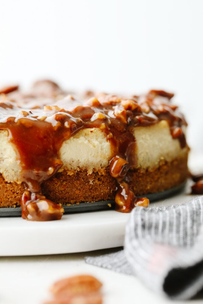 This dessert is everything you love about pecan pie, drizzled on the most decadent, creamy cheesecake! Each bite of pumpkin pie cheesecake will wow you! A full pecan pie cheesecake.