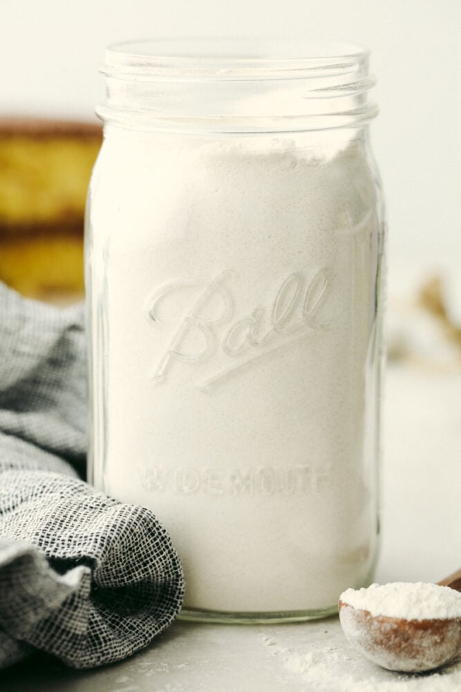 Yellow cake mix is a staple recipe that can be used in countless desserts! It's super easy to throw together and only requires a handful of ingredients. Jar full of dry cake mix ingredients.