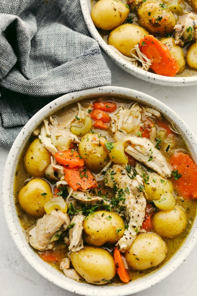 Chicken Stew is hearty, filling, and comforting! It is the perfect dish for Sunday dinner or a cold rainy day! This chicken stew is made with potatoes, carrots, onions, celery, and chicken cooked until fall-apart tender. Chicken stew in a bowl, ready to serve.
