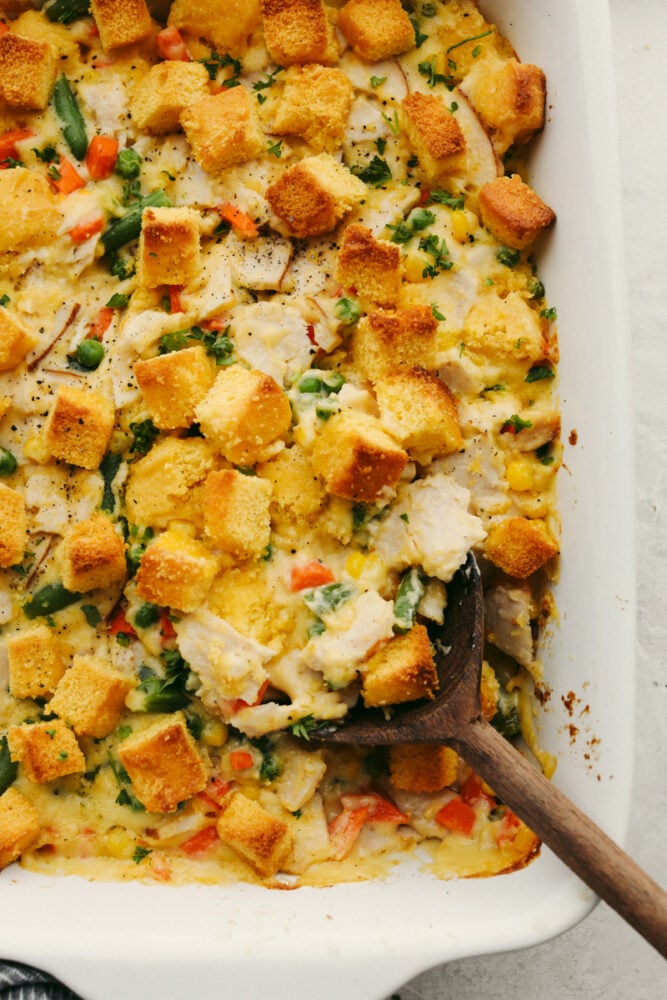 This leftover turkey casserole is creamy and delicious! Made with your leftover turkey, it's the easiest recipe to make just after Thanksgiving! It's SOO GOOD! Turkey casserole in a baking dish.