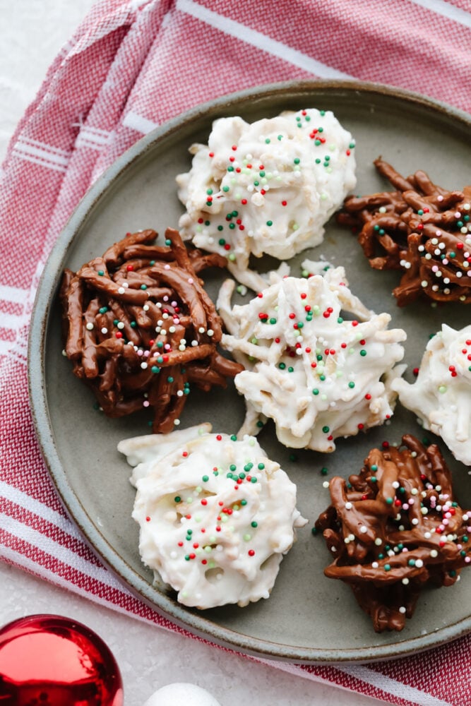 Haystack cookies are perfect for the holidays! They are festive, have the perfect crunch, and are so good that you won't be able to stop at just one! Haystack cookies on a plate.