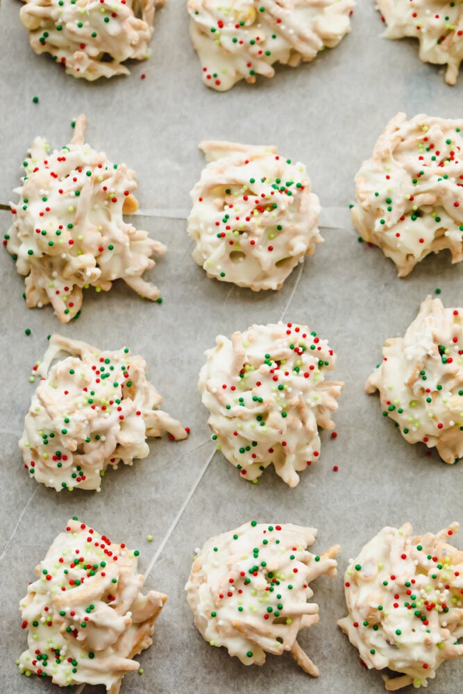 Haystack cookies are perfect for the holidays! They are festive, have the perfect crunch, and are so good that you won't be able to stop at just one! A zoomed in picture of a white chocolate haystack cookie.