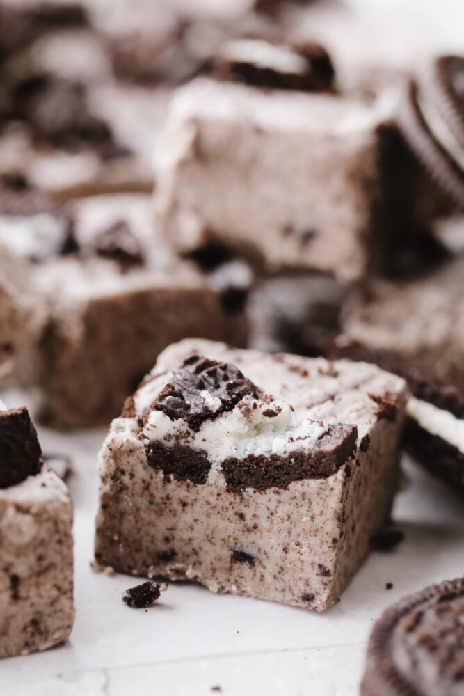 Fudge is a classic holiday treat and these cookies and cream flavor really takes it to the next level. Creamy, Oreo fudge just cannot be beat! A square of cookies and cream fudge.