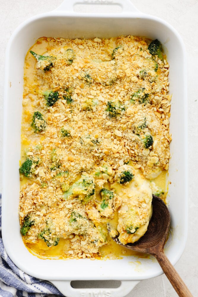 Comfort food at its finest, this broccoli cheddar chicken will fill you right up! Insanely delicious and straightforward to make, this is a dinner your entire family will go crazy over! A casserole dish with broccoli cheddar chicken.