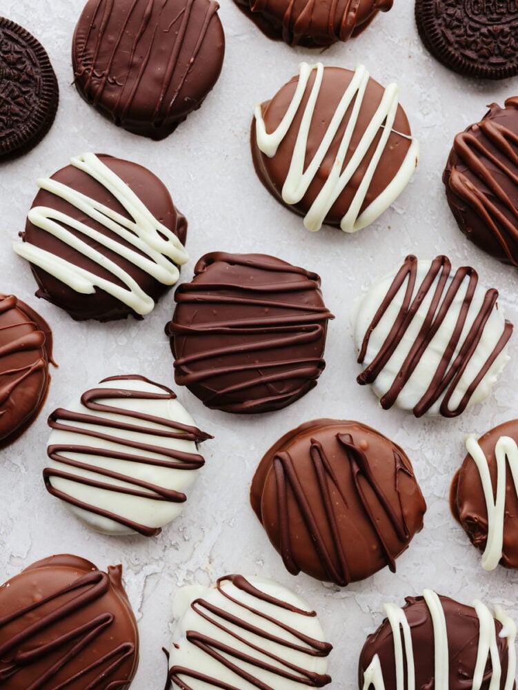 Add a layer of indulgence to a classic cookie with these chocolate covered Oreos! These little bites of chocolatey goodness are a crowd-pleaser wherever they go! A variety of white, milk, and dark chocolate covered Oreos.
