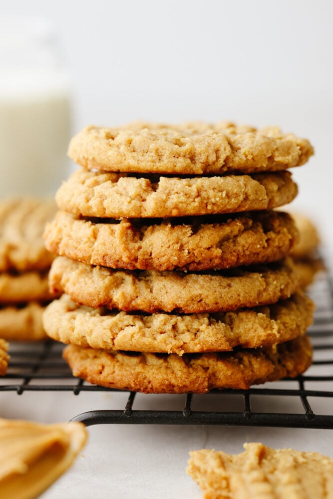A flourless twist on a classic cookie? Yes, please! These cookies are packed with incredible peanut butter flavor and perfect for any gluten-free diet! A stack of flourless peanut butter cookies.