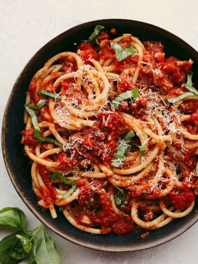 This classic bucatini all'Amatriciana is packed to the brim with flavor from spices and herbs! If you are looking for a recipe to impress your guests, then look no more. This is the one!ย