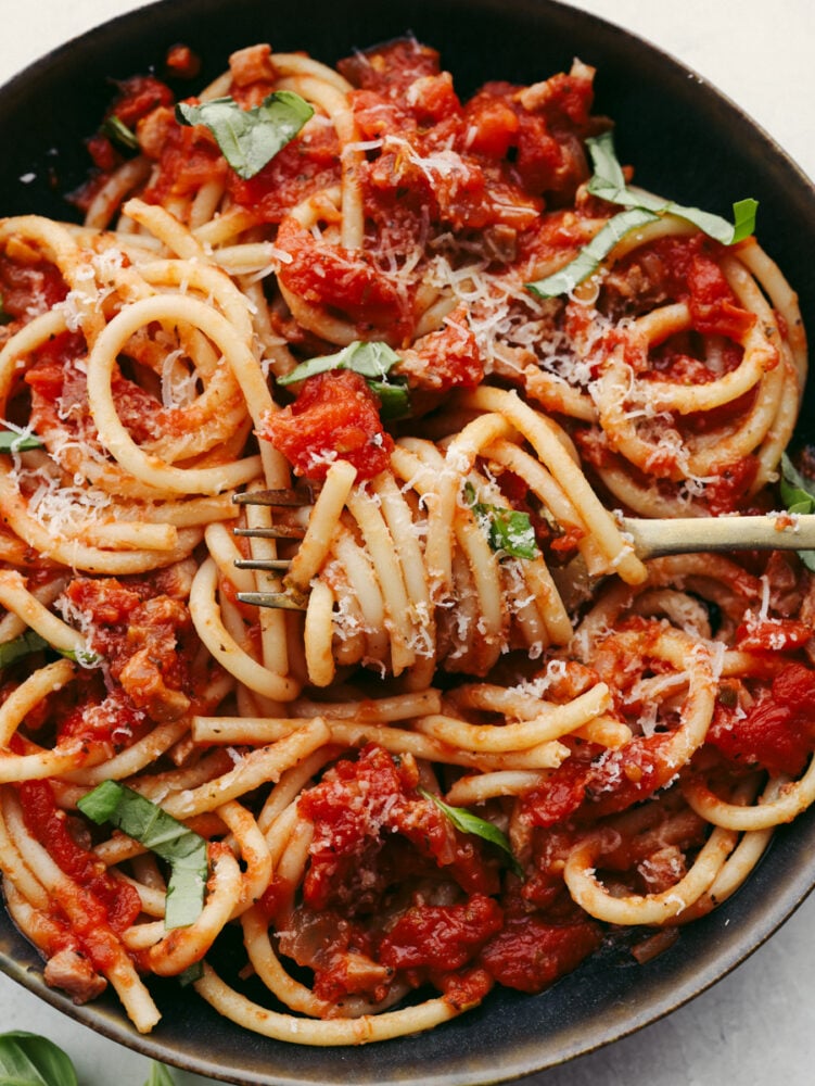 This classic bucatini all'Amatriciana is packed to the brim with flavor from spices and herbs! If you are looking for a recipe to impress your guests, then look no more. This is the one!ย