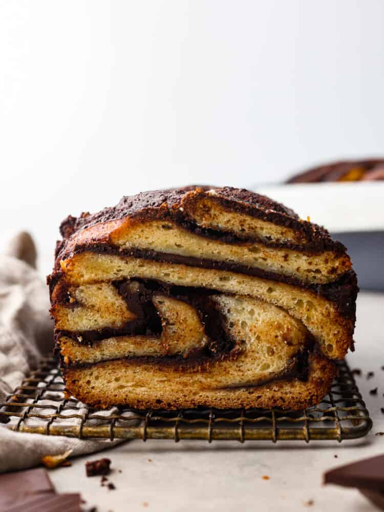 Youโre not going to be able to get enough of this soft, sweet babka bread filled with luscious chocolate! With its beautiful swirled interior, it looks as good as it tastes! Bread cut so that the swirled interior can be seen.