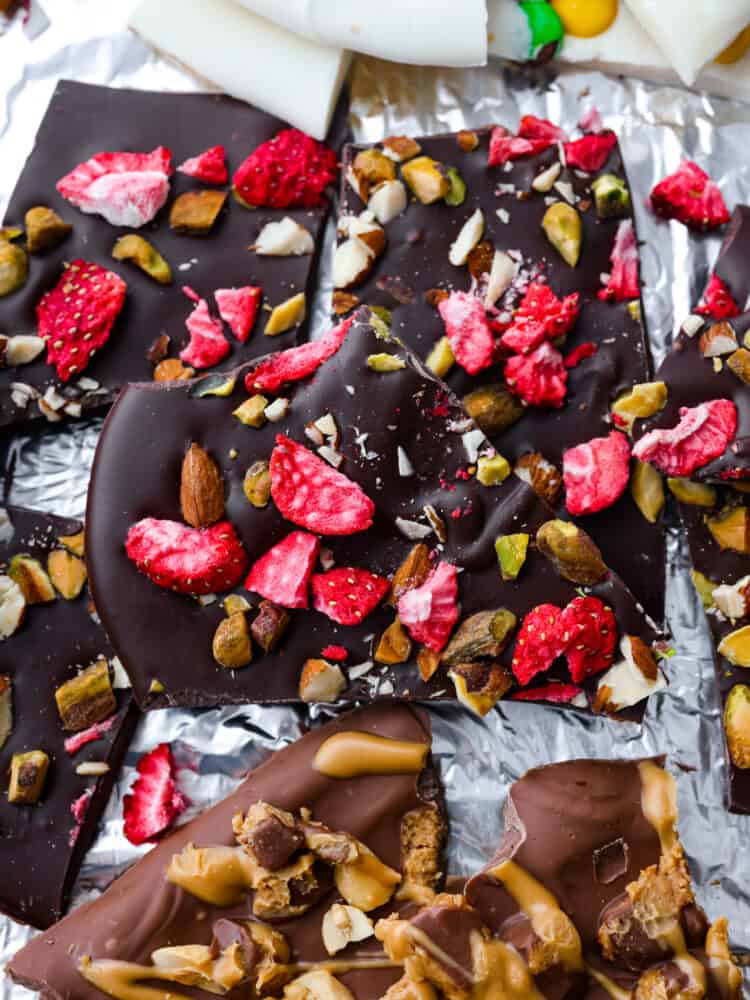 This delicious Chocolate Bark made withย Reynolds Wrapยฎ Heavy Duty Foilย will be the tastiest and simplest dessert you make all holiday season! It's quick and easy, and your entire family will go crazy over it! A closeup of dark chocolate bark.