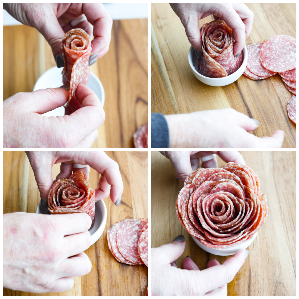 Throw a fun party and ring in the new year with this fantastic New Year's charcuterie board! Endless options of sweet and savory finger foods will keep your guests awake until midnight. First photo of how to make a salami rose starting in the middle and layering salami to build a rose. Second photo of placing the salami rose in the middle of the bowl. Third photo placing more salami on the rose to fill in the bowl. Fourth photo is fanning out the salami petals to resemble a rose on the charcuterie board.