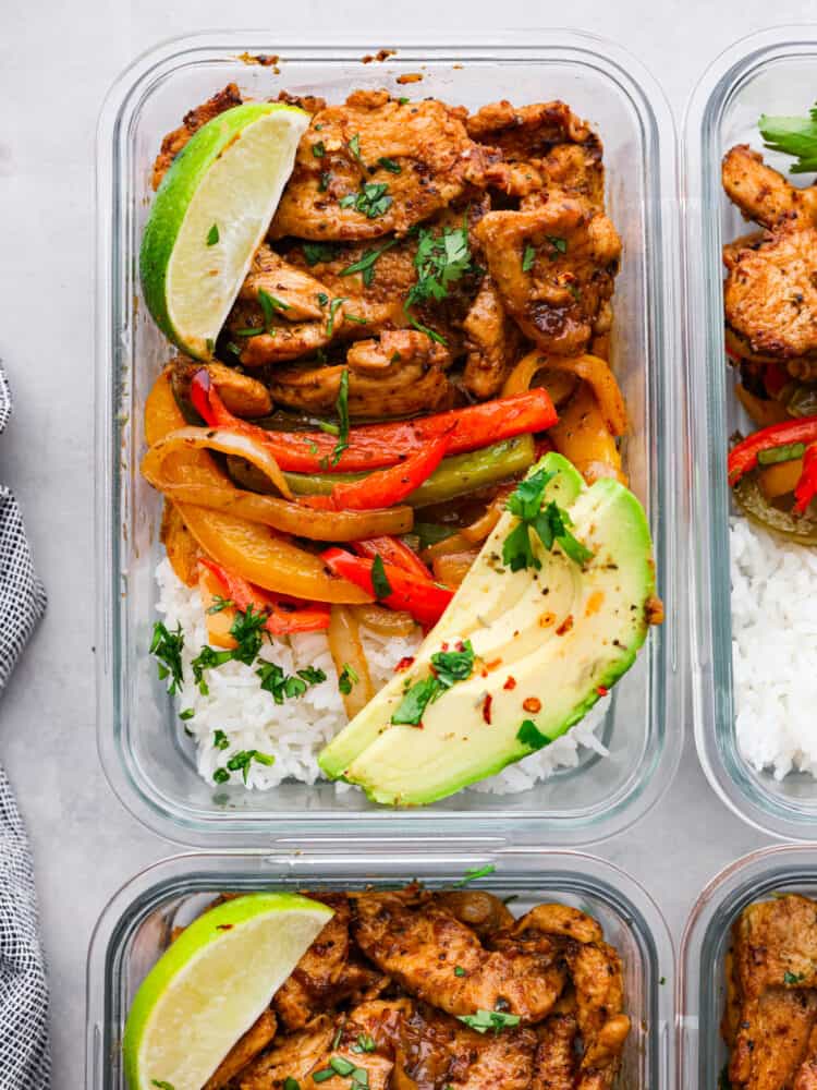 Whether you are trying to stick to a diet, eat out less, or just stop stressing about what to make for dinner, these Chicken Fajita Meal Prep Bowls are your answer! This recipe makes a flavorful and filling meal that is ready to go for the perfect work lunch or quick dinner. Chicken fajita meal prep bowls with rice and peppers.