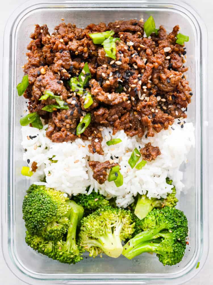 Ready to spice up your meal prep game? Look no further than these delicious Korean beef meal prep bowls! Perfect for busy moms on the go, these bowls are packed to the brim with flavor and nutrition. Closeup of a Korean beef meal prep bowl.