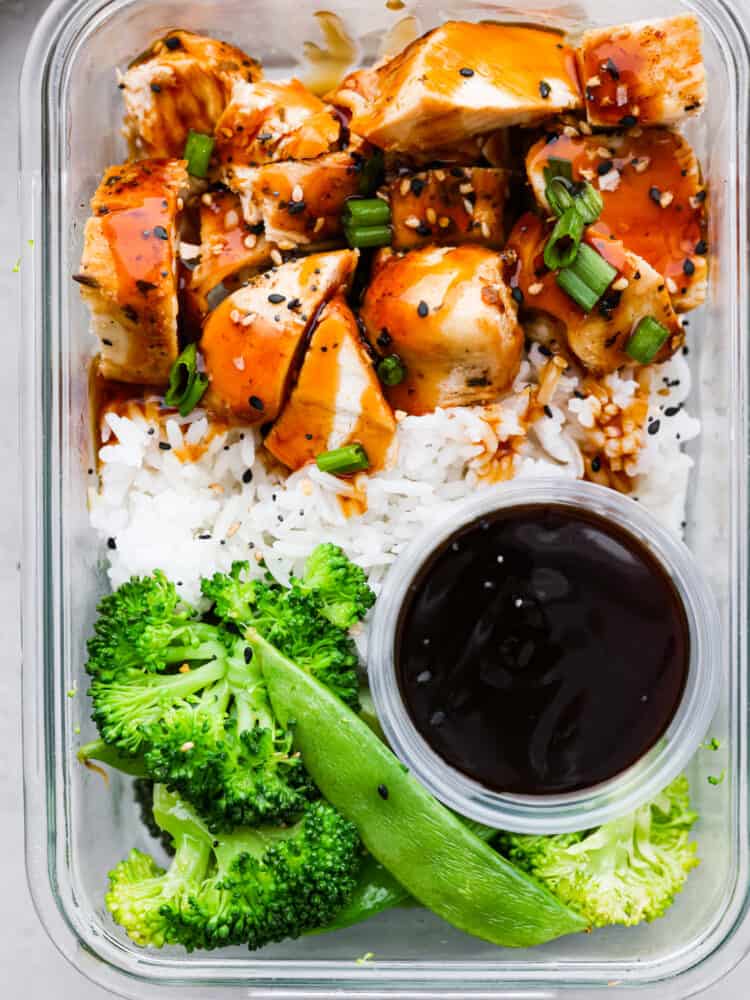 Teriyaki chicken meal prep bowls are perfect for a busy week because they are filling, full of flavor, and healthy. This is an easy make-ahead meal that is something the whole family will love. For lunches or quick dinners, you won't regret having these in the fridge! A close up of a teriyaki chicken meal prep bowl.