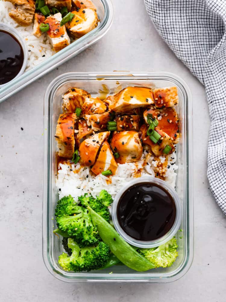 Teriyaki chicken meal prep bowls are perfect for a busy week because they are filling, full of flavor, and healthy. This is an easy make-ahead meal that is something the whole family will love. For lunches or quick dinners, you won't regret having these in the fridge! Teriyaki chicken meal prep bowls in glass containers