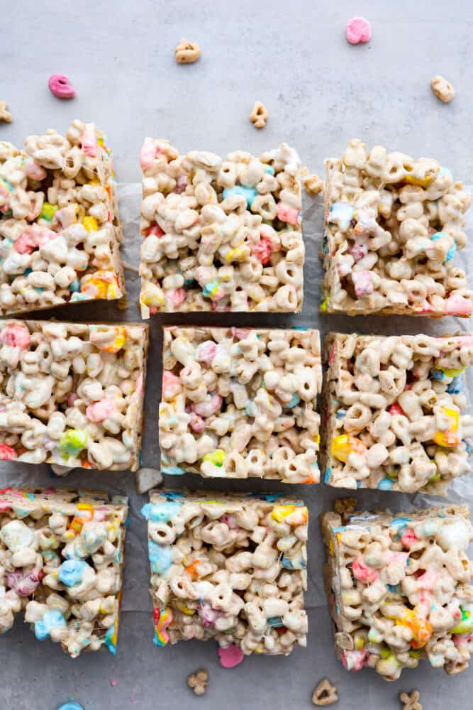 These Lucky Charms treats are a fun twist on the classic rice krispie treat and are every bit as magically delicious as you could imagine! They are sweet, but not too sweet to keep coming back for seconds and even thirds. They are a colorful and quick treat perfect for every occasion. An overhead view of the lucky charms treats.