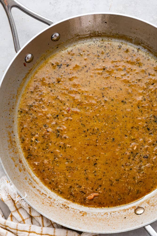 Elevate your chicken breast dinner with this simple and elegant Chicken Pan Sauce. Made with simple ingredients you already have in your kitchen, this sauce takes just 20 minutes to make and will please even the pickiest palates! It's flavorful, juicy, and a must-have in your recipe book. An overhead view of the pan sauce.