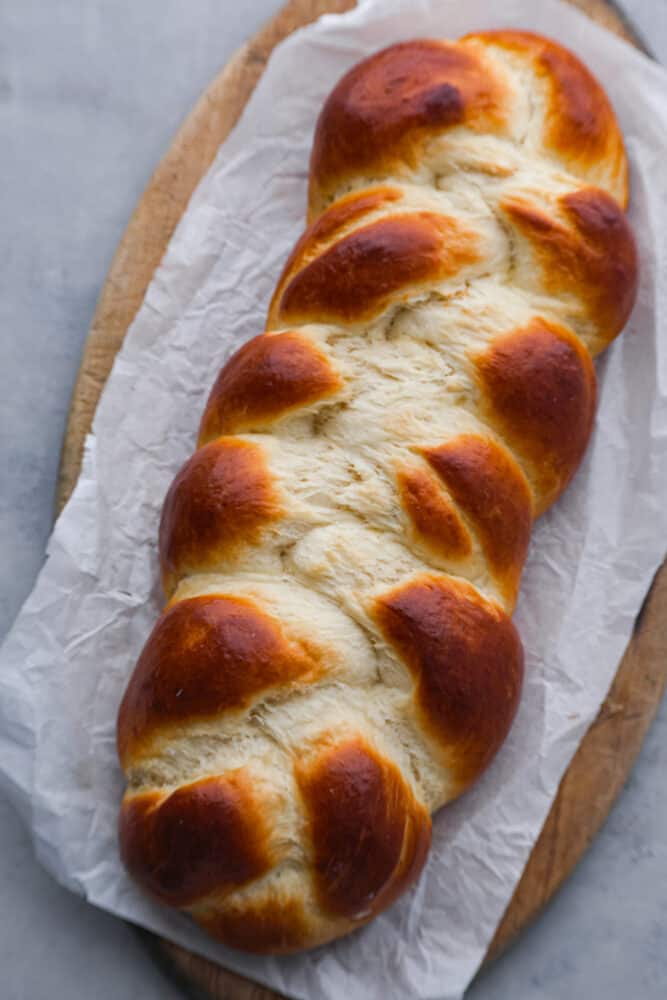 If you want to start making more bread at home, this brioche bread is the perfect place to start! Not only is it beautiful, fluffy, and super delicious, it's also really easy to make. This bread is perfect for sandwiches, French toast, or just eating plain! A top view of the brioche loaf.