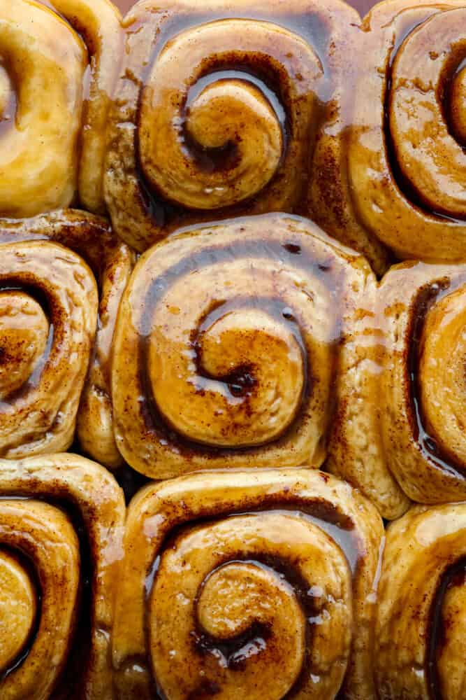Caramel Rolls are as heavenly as they sound! Delicious and delicate cinnamon rolls are covered in caramel sauce that melts into every nook with absolutely divine flavor in every bite. I am not kidding when I say this is a next-level dessert experience! An overhead view of caramel rolls.
