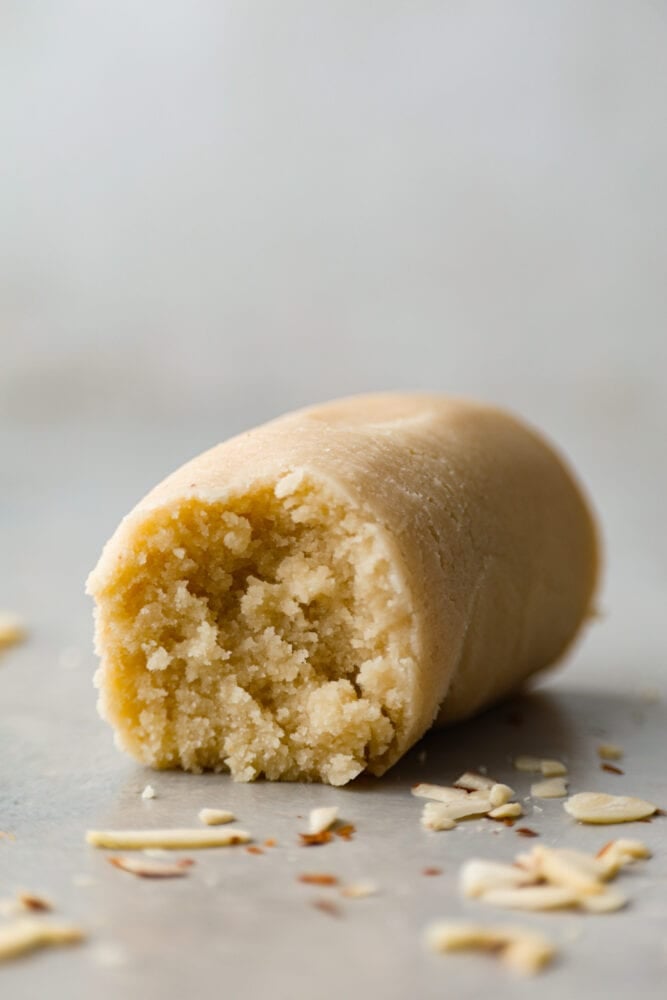 This Easy Homemade Marzipan will take your baking to the next level! It's a quick and simple recipe that will bring delicious almond flavor to your cakes and cookies. It's also easily colored and shaped into fun decorations! A close up on marzipan.