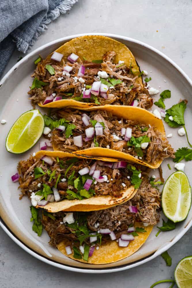 Making carnitas in an Instant Pot is foolproof. With just a few simple ingredients and the magic of pressure cooking, you can have a delicious and satisfying meal ready in no time. Make a batch of this juicy shredded pork for your next taco night, you won't regret it! 4 Instant Pot carnitas tacos.
