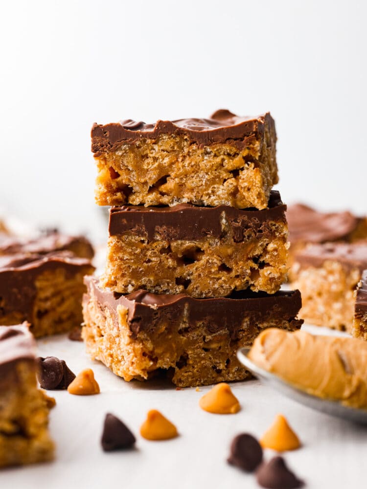 These Special K Bars are a delicious combination of smooth peanut butter, crispy Special K cereal, and a rich chocolate-butterscotch topping. This quick and easy recipe is a sweet treat that will leave you craving more. A stack of Special K bars.