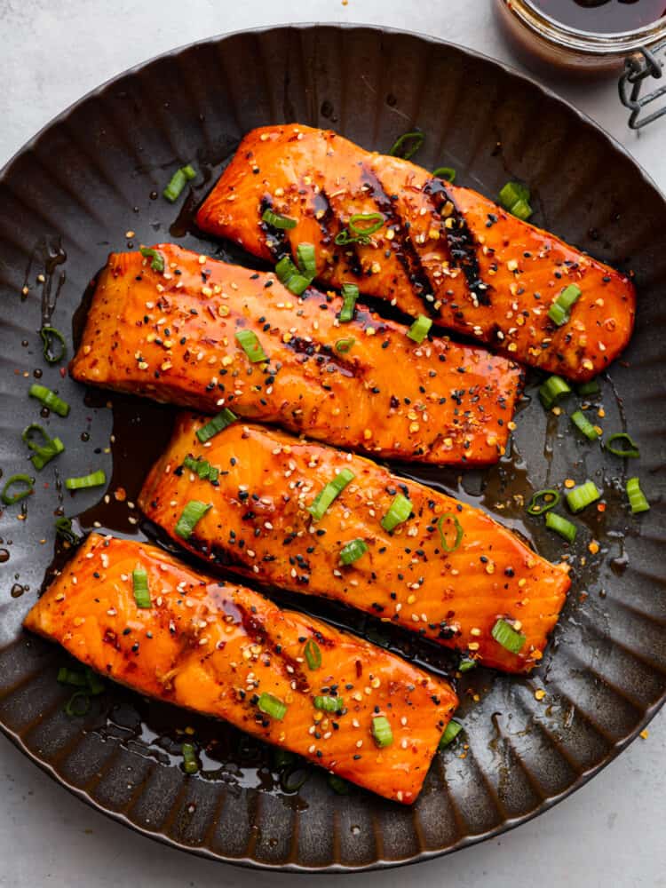 Ignite your taste buds with this incredible firecracker salmon! The fish is extra tender and flaky, coated in a delicious homemade glaze. 4 salmon filets coated in firecracker sauce.