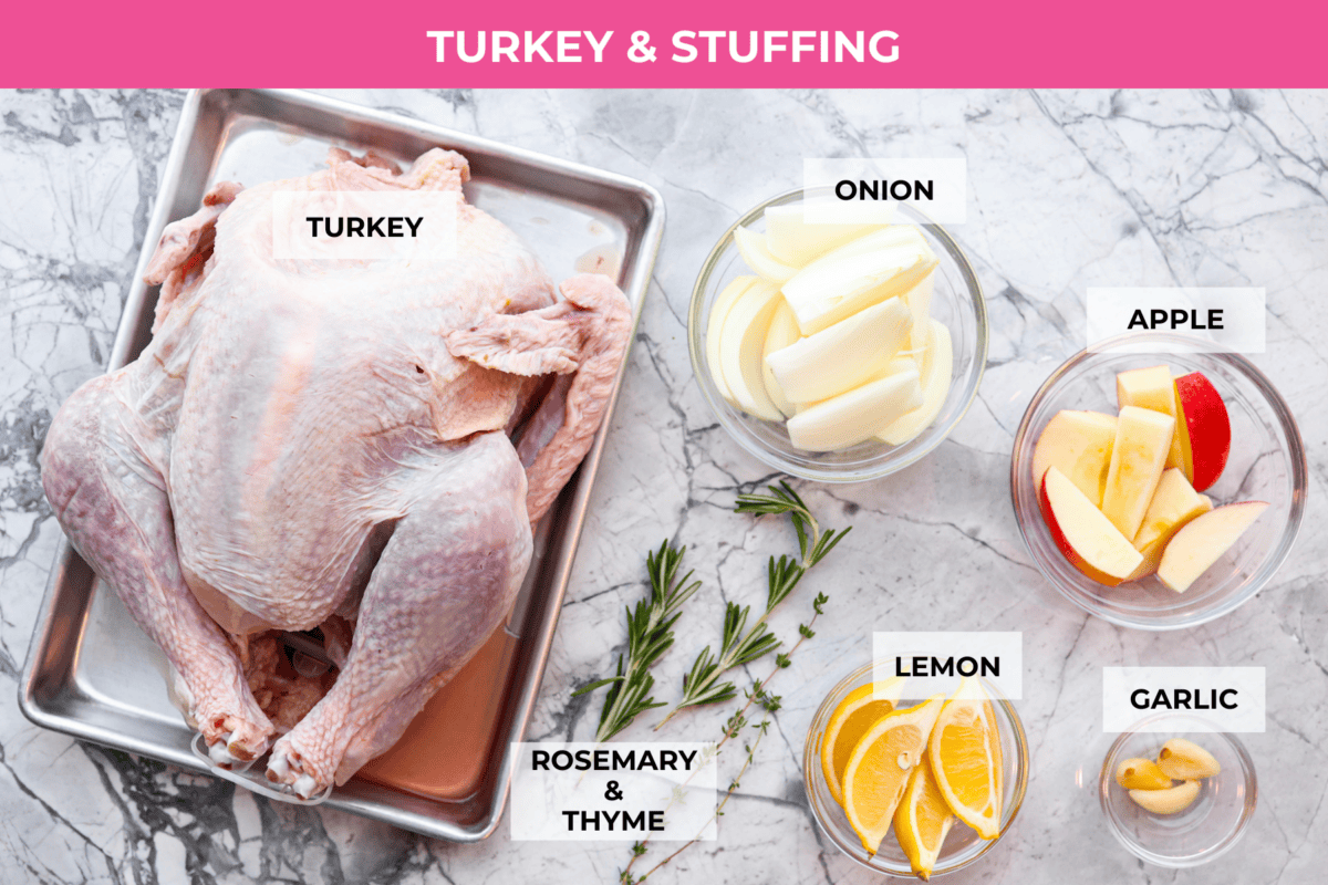 Look no further! This roasted turkey recipe is the absolute juiciest, fool-proof turkey recipe you will ever need. You'll have the confidence to make a perfect turkey every time. This deliciously seasoned turkey will be the star of your Thanksgiving meal! Top view of Ingredients labeled individually.