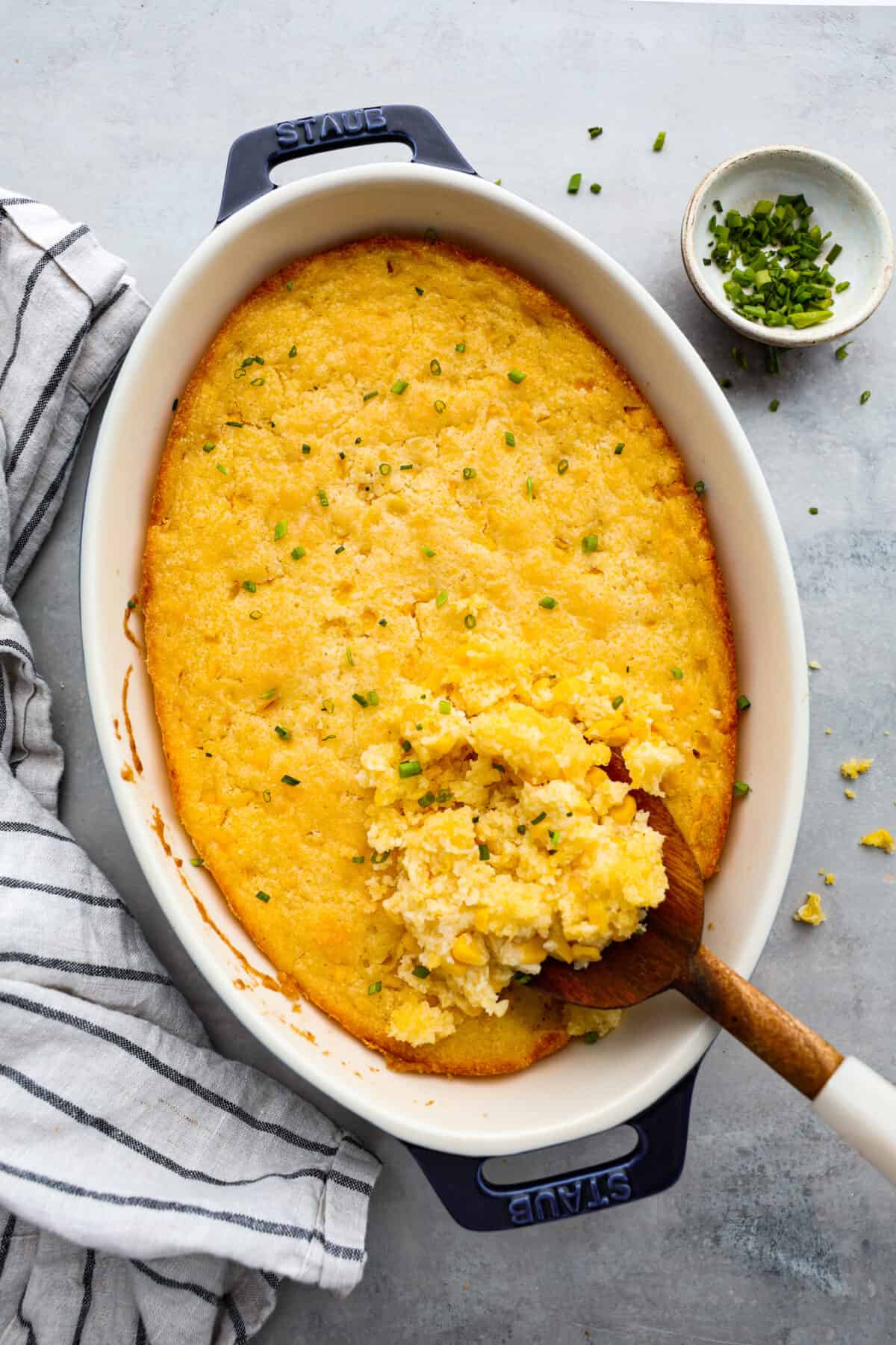 5 Ingredient Corn Casserole is in the oven for less than five minutes. It's the perfect side dish for the holidays with almost no effort at all! The top view of corn casserole.