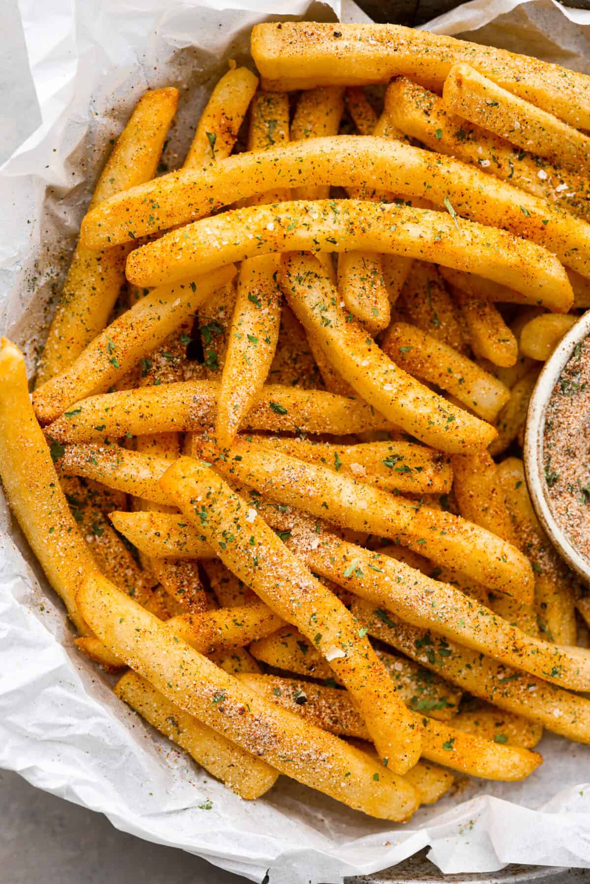 Upgrade your fries with this perfected French fry seasoning! It's packed with flavor, making your homemade fries way better than the drive-thru ones. French fries that are seasoned and ready to eat.