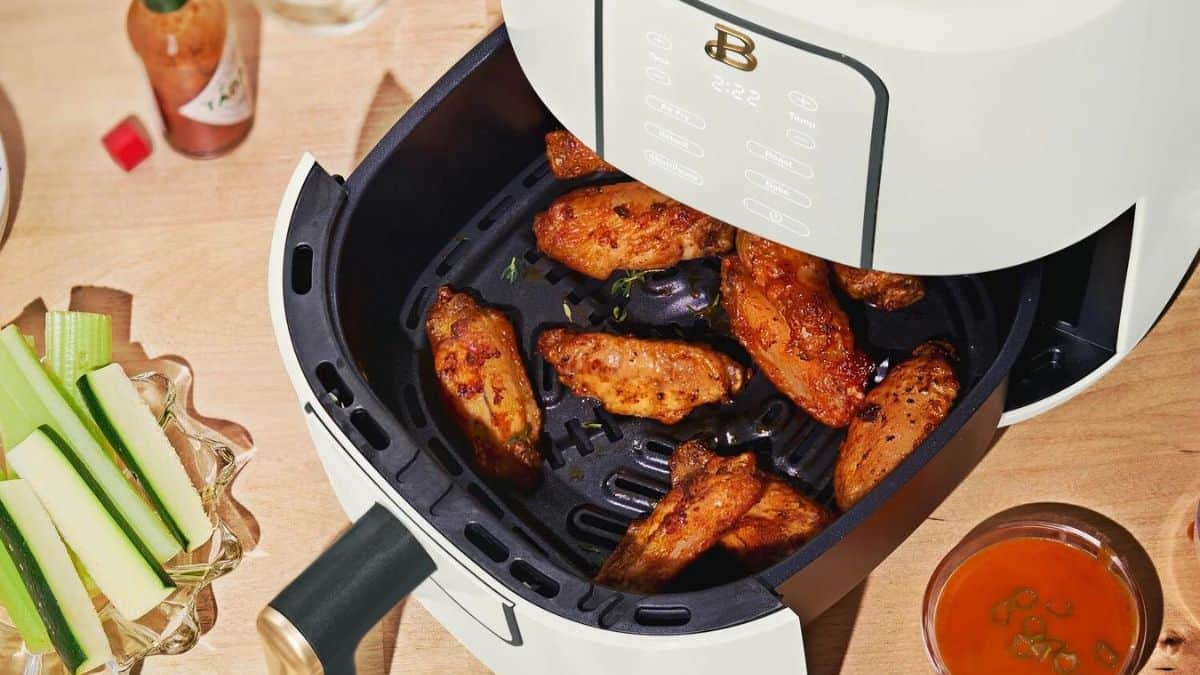 My air fryer is one of my favorite appliances in the kitchen because it can cook all my familyโs favorite recipes, including tender meats, roasted sides, crispy appetizers, and everything in between. Wings in an air fryer basket.