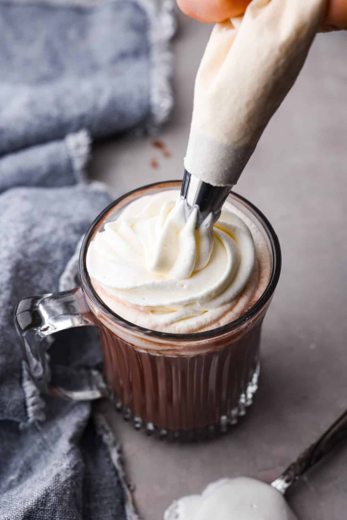 Two of my favorite things combined: marshmallow fluff and fresh whipped cream! It's perfect for adding to your favorite desserts, and is so good, you'll want to eat it straight from the bowl. Adding a dollop of marshmallow cream to hot chocolate.