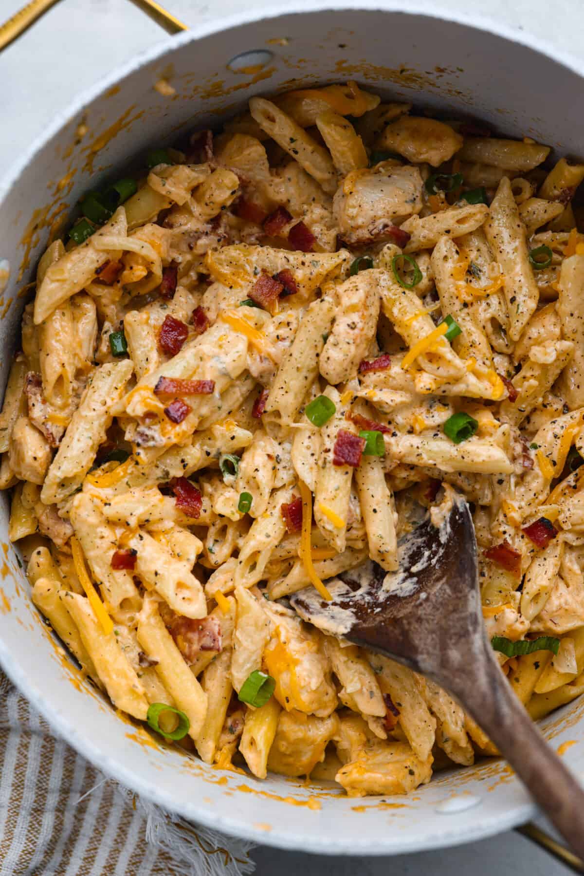 Cheesy, creamy, and loaded with ranch flavor and chunks of juicy chicken, 'Crack Chicken' pasta is a dinner that will have everyone raving! And as if you needed more reason to make it, it's ready in 30 minutes from start to finish! Crack chicken pasta in a large pot.